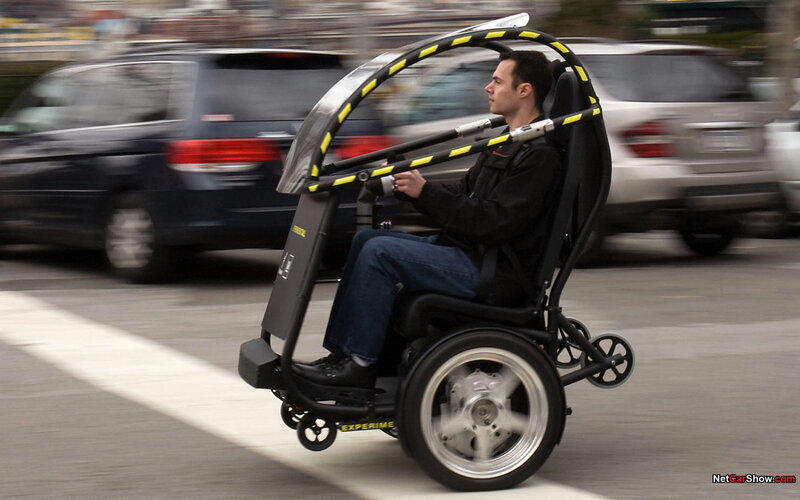 man riding a personal mobility device