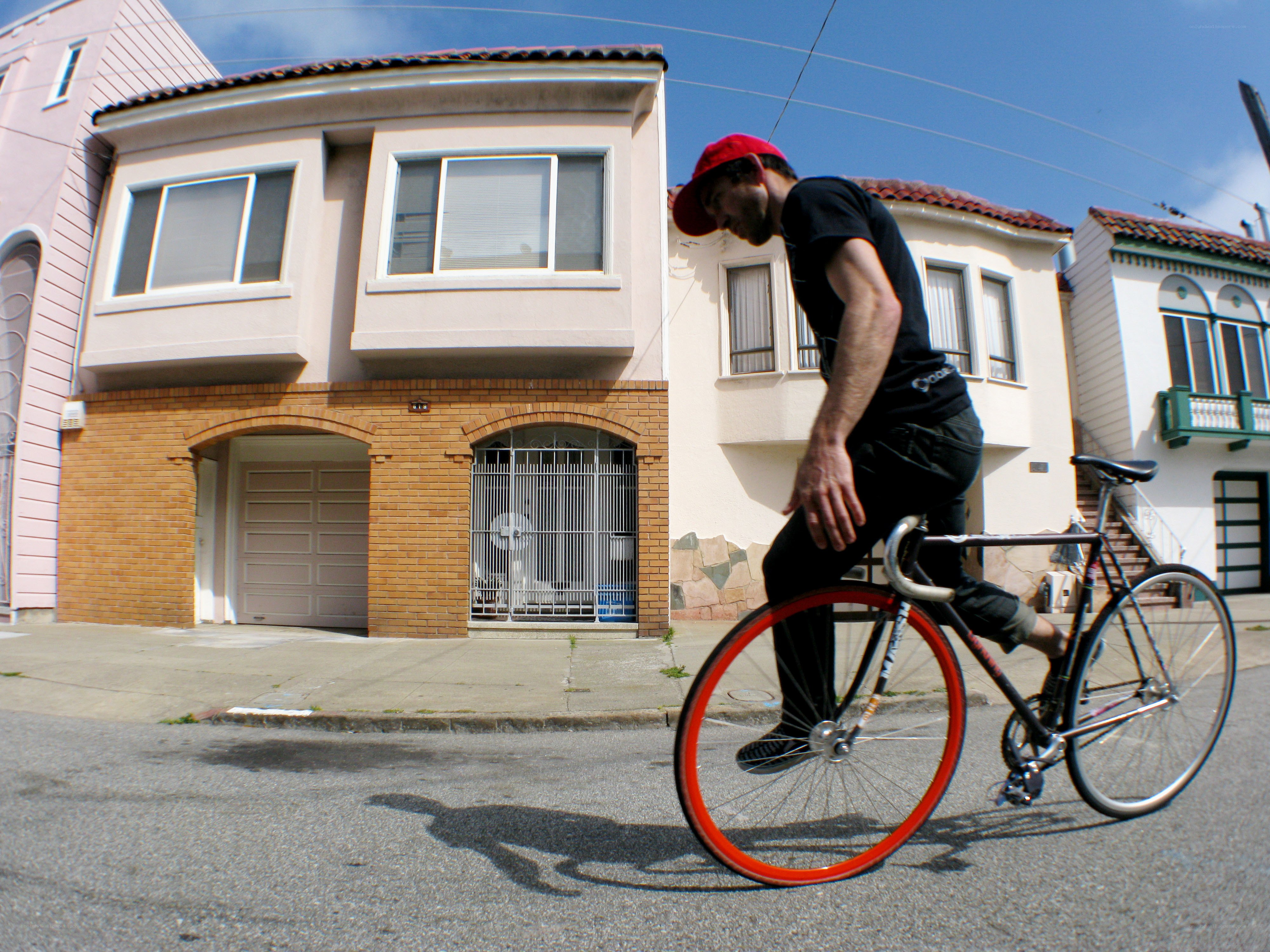 Man riding bicycle on street