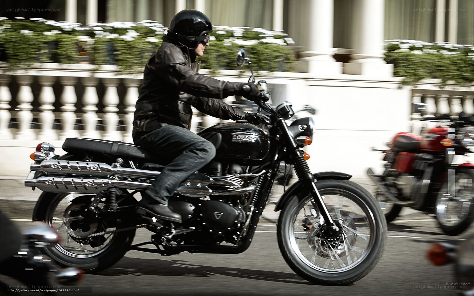 Man riding black motorcycle