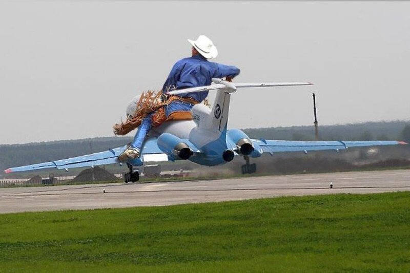 man riding jet plane