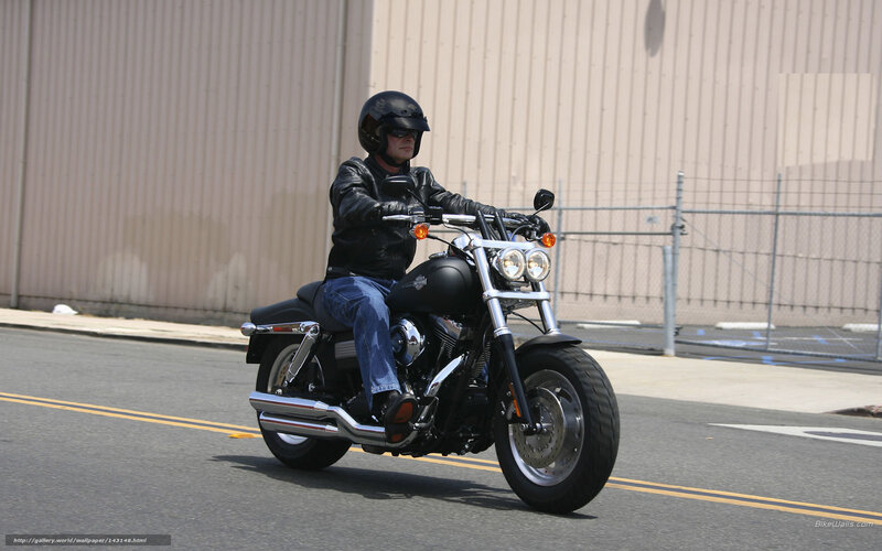 Man Riding Motorcycle — Black