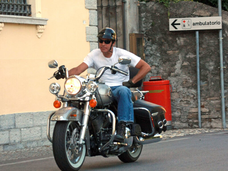 Man Riding Motorcycle — Gray