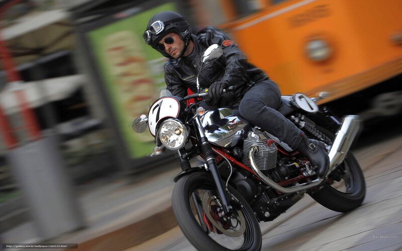Man riding motorcycle in city
