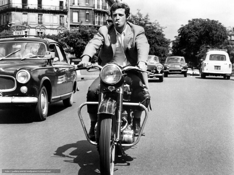 Man riding motorcycle in city