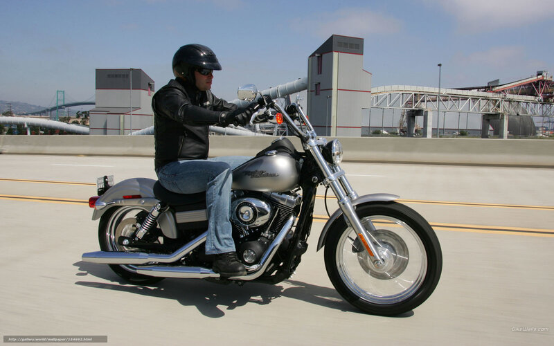Man Riding Motorcycle — Silver