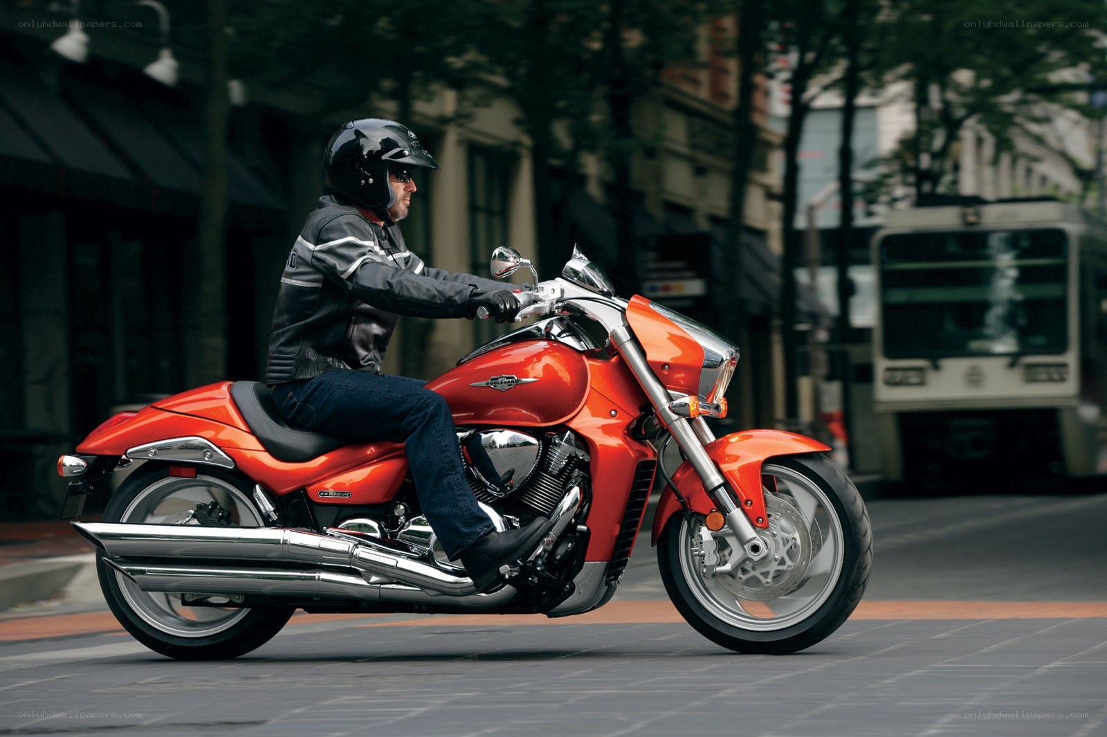 Man riding red motorcycle