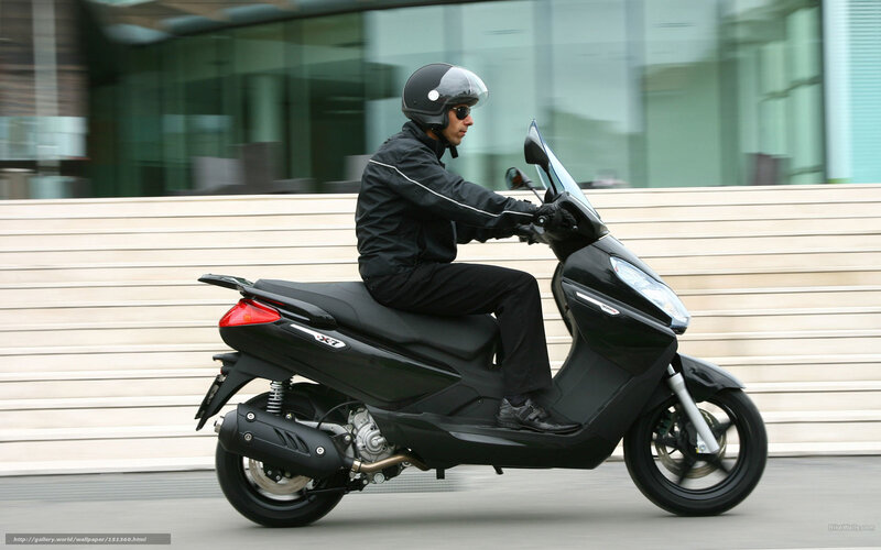 Man Riding Scooter — Black, Dynamic, Afternoon, Photograph