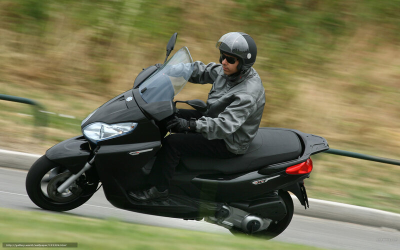 Man Riding Scooter — Black, Dynamic, Afternoon