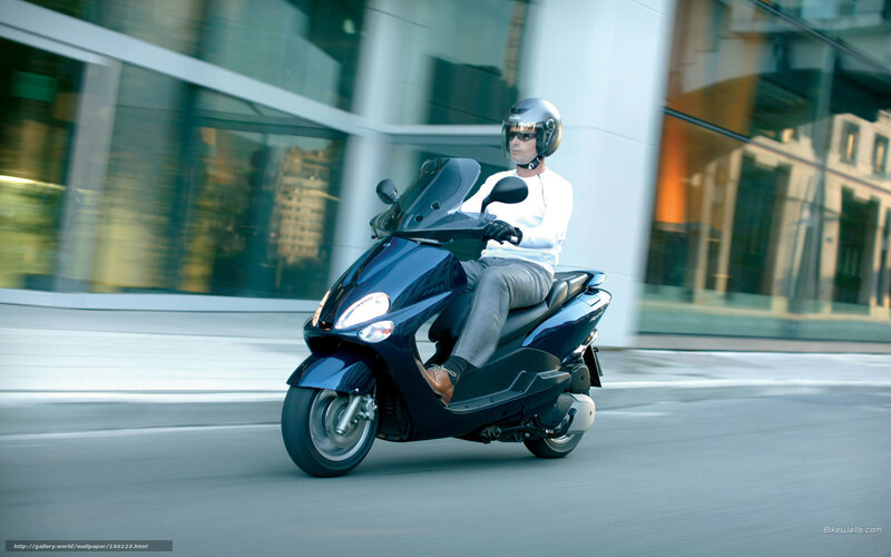 Man Riding Scooter — Blue