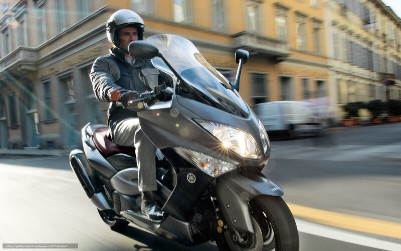 Man Riding Scooter — Gray, Dynamic, Afternoon