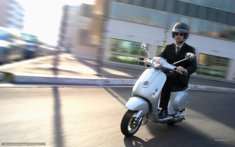 Man Riding Scooter — Silver, Dynamic, Afternoon, Photograph, Building