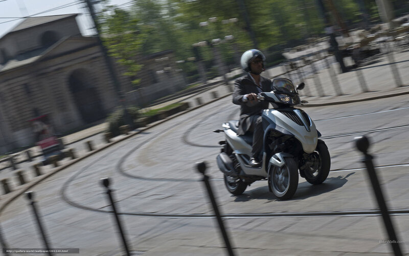Man Riding Scooter — Silver, Dynamic, Afternoon, Photograph, Helmet, Building, Street