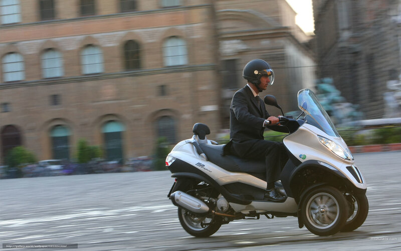 Man Riding Scooter — Silver, Dynamic, Afternoon