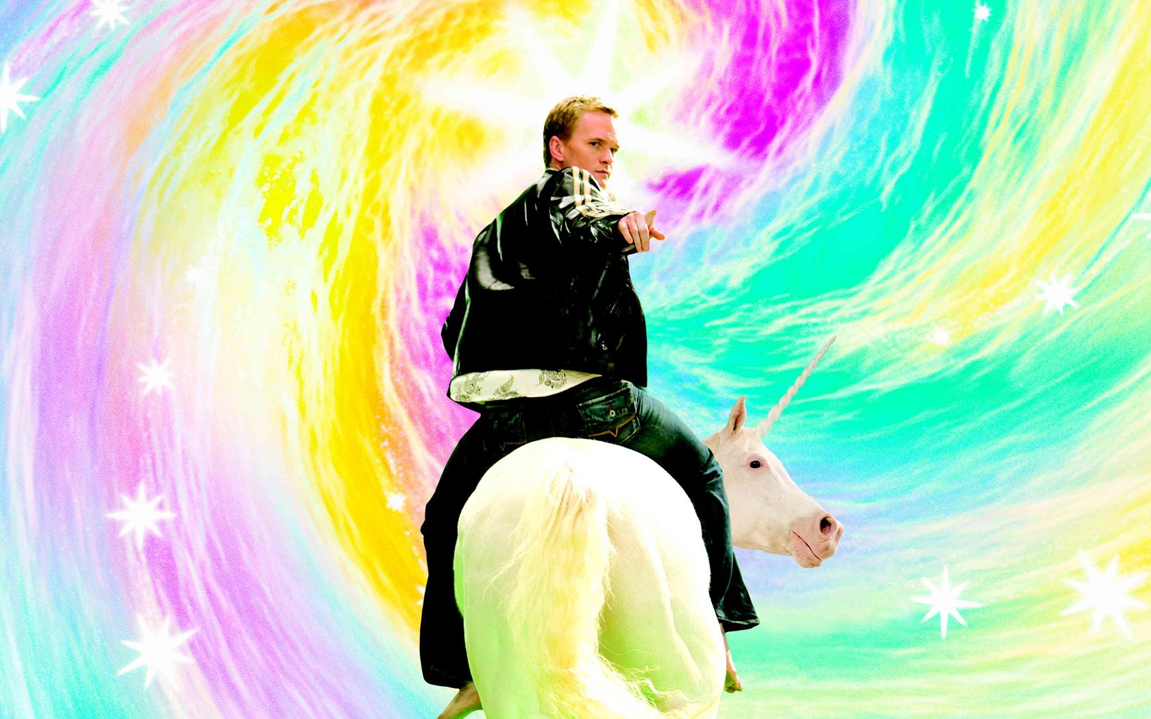 man riding unicorn in rainbow
