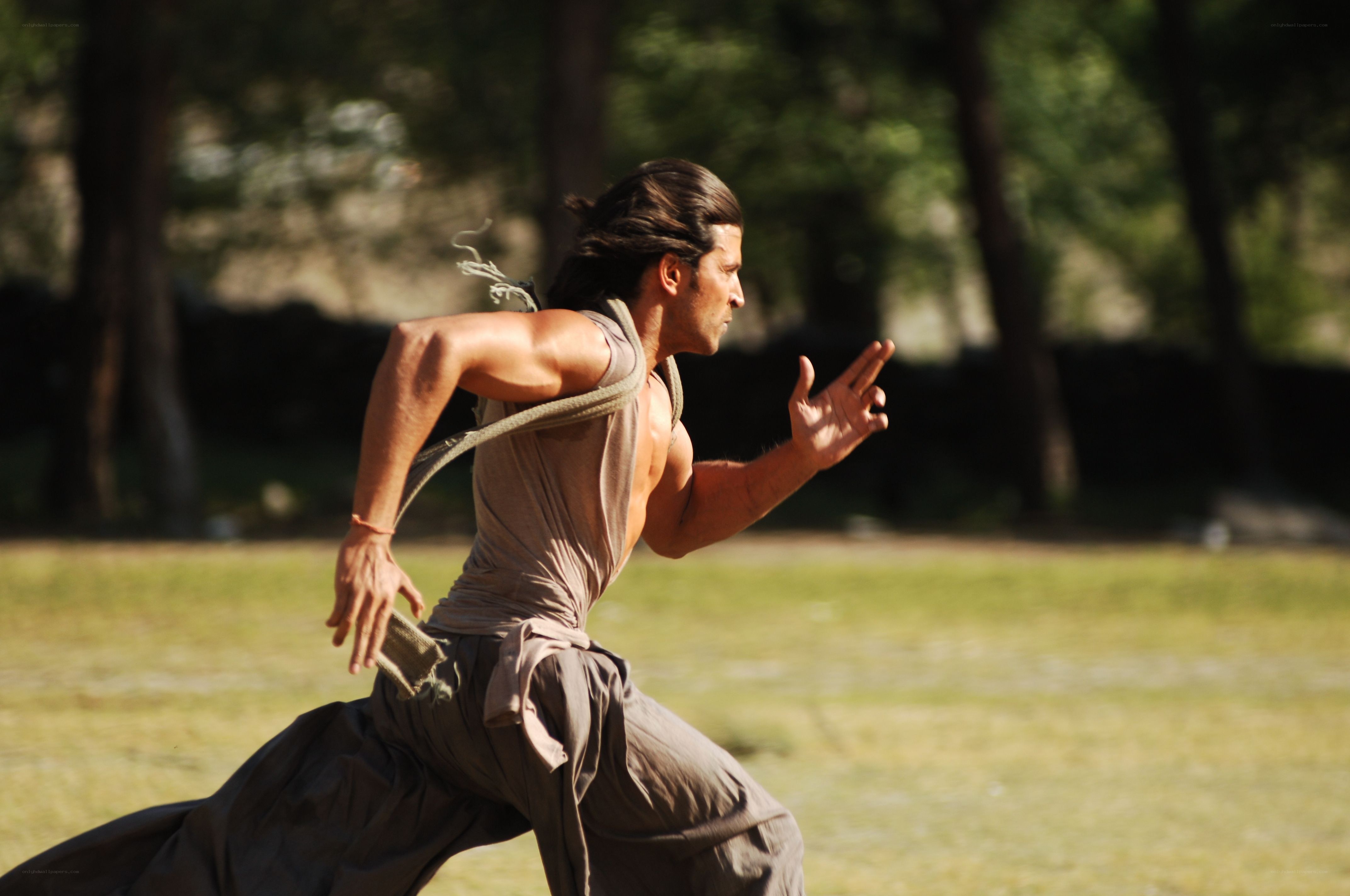 man running in a field