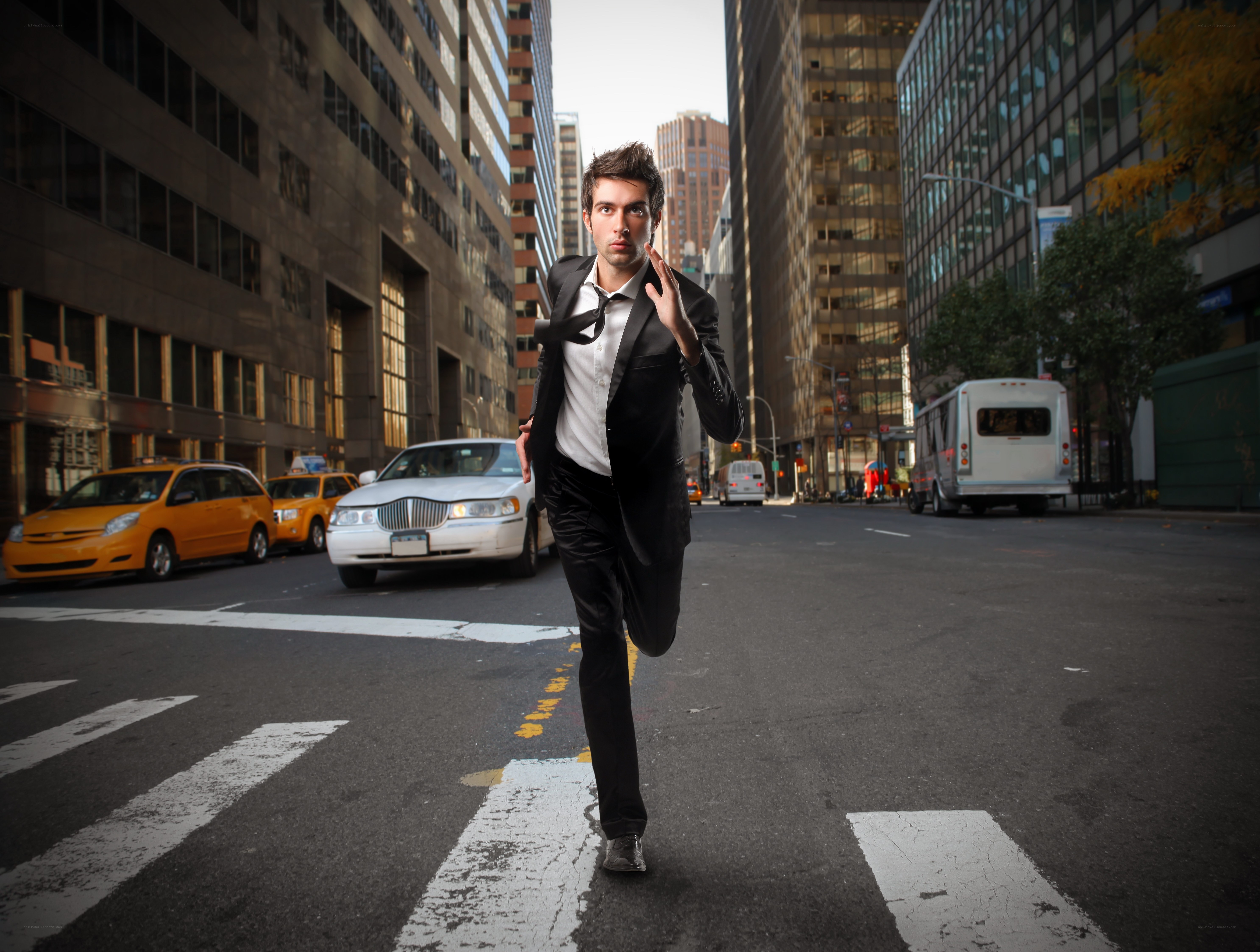 Man running in city street