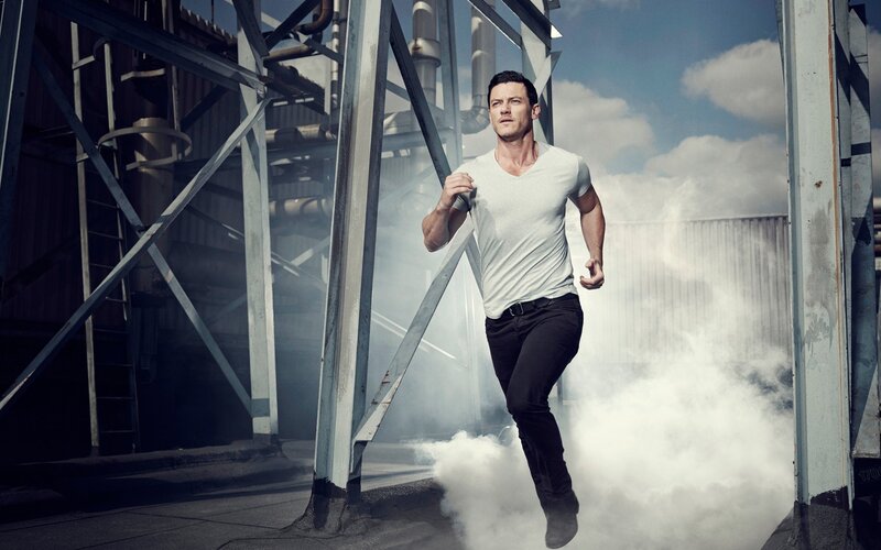 Man Running in Industrial Area