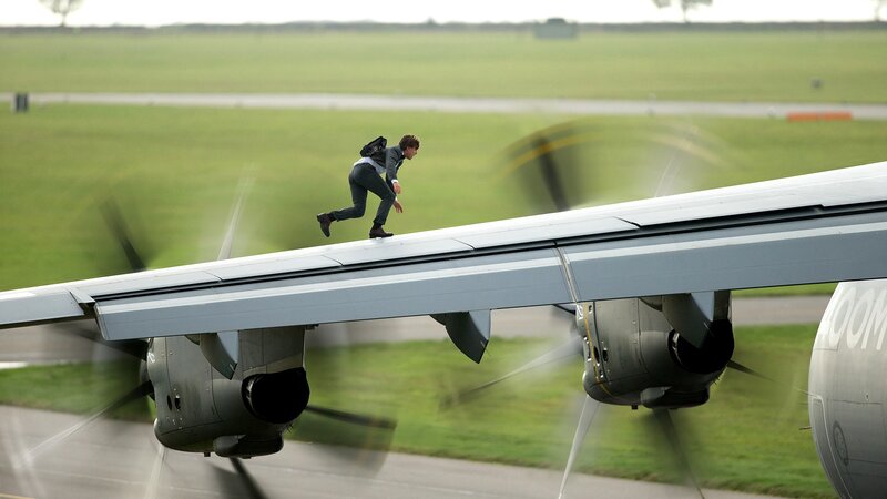 Man Running on Airplane Wing
