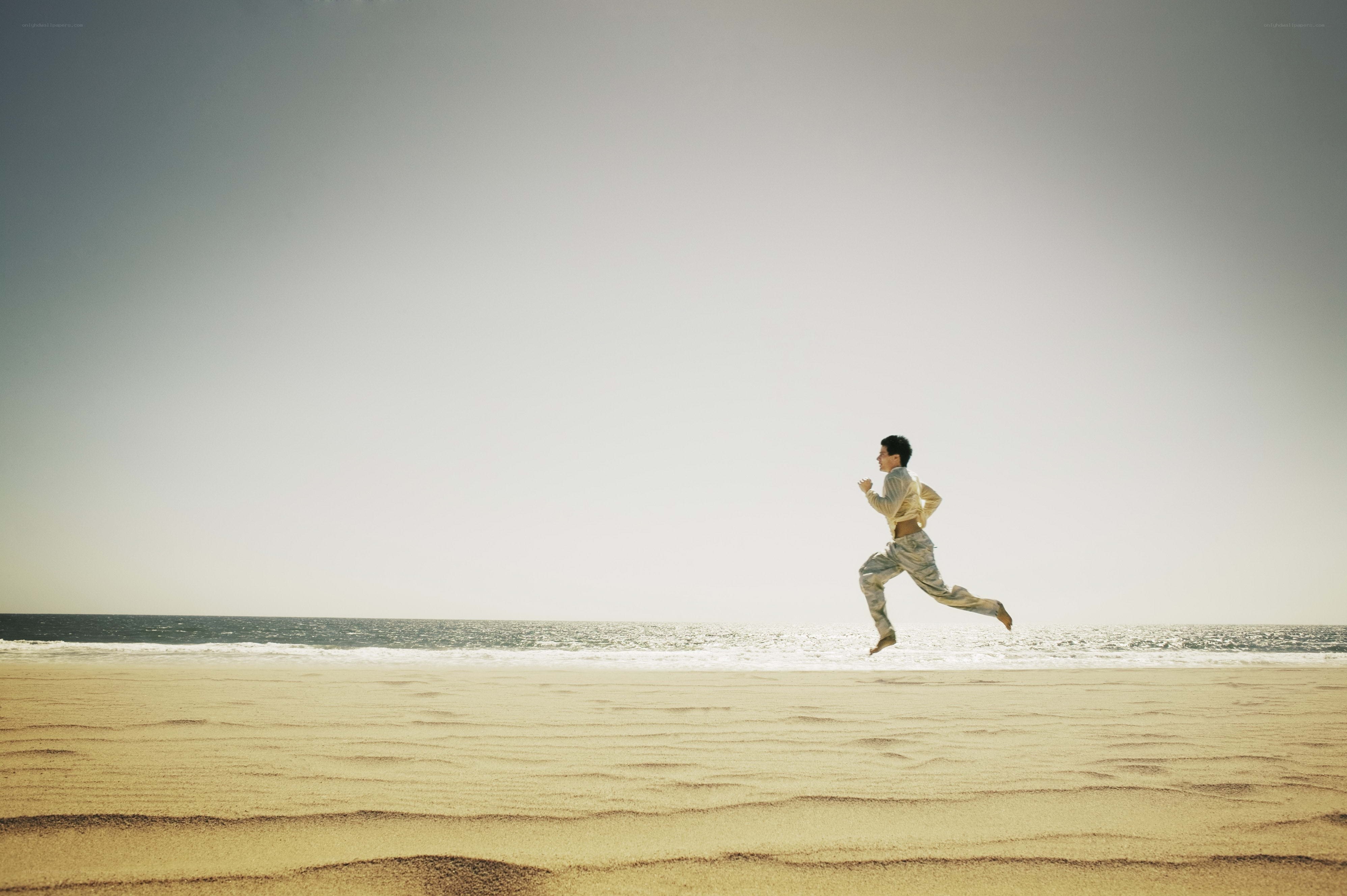 Man running on beach