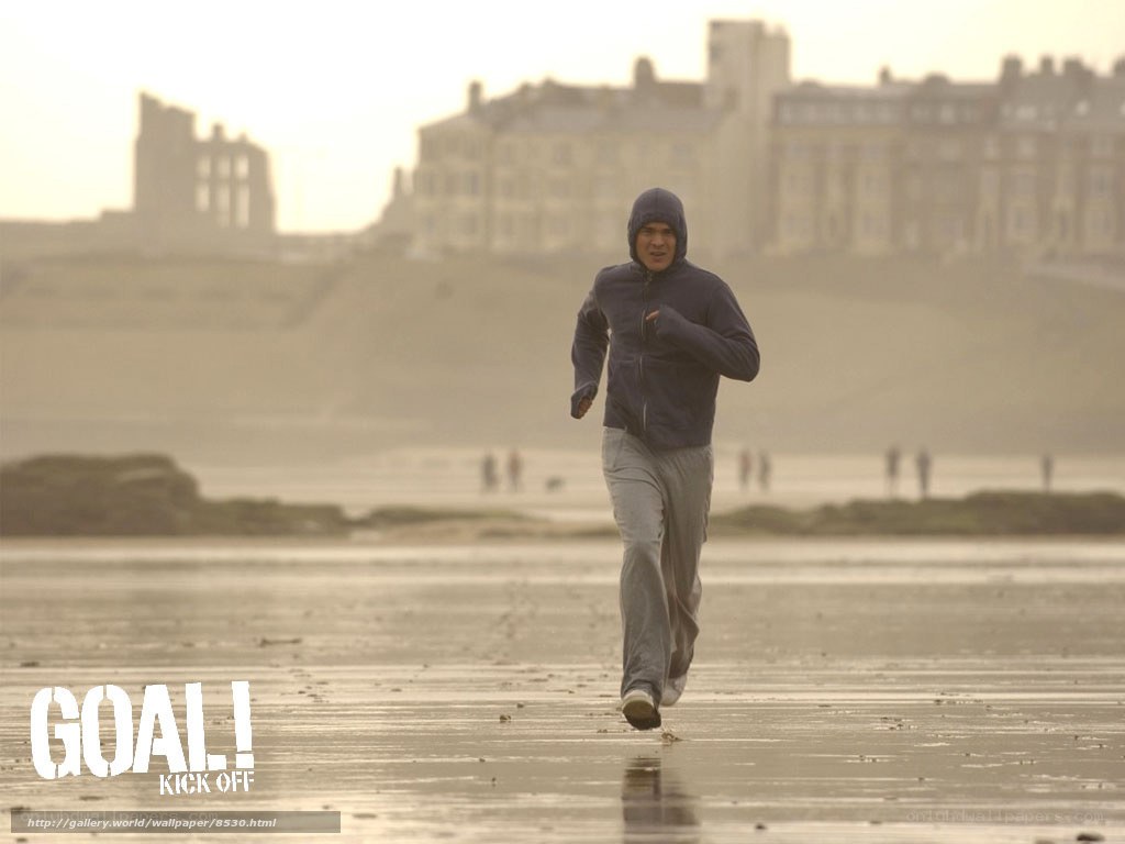 man running on beach