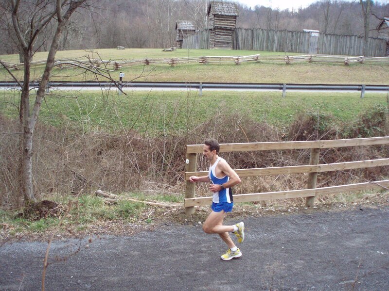 Man Running on Road — Blue