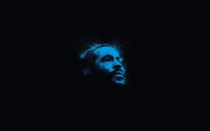 Man's Face in Blue Particles