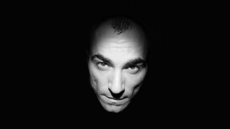 Man's Face in Darkness