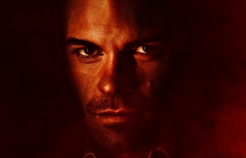 Man's Face in Red Light — Dramatic