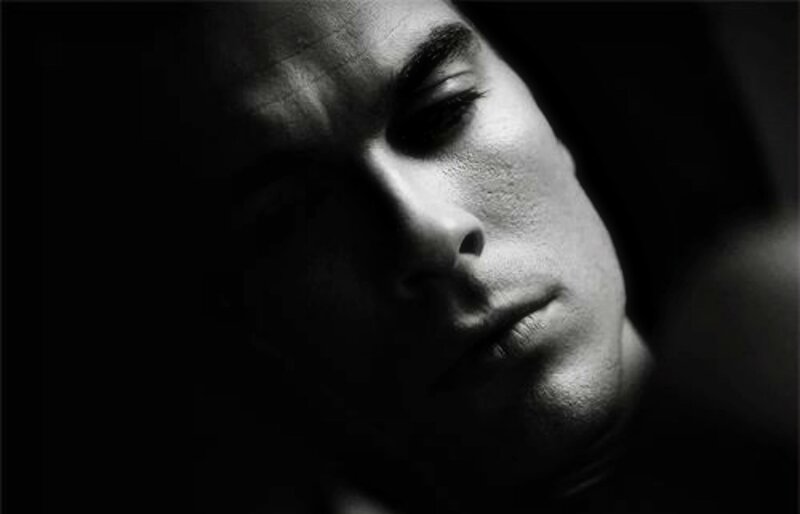Man's Face in Shadow — Black, Dramatic