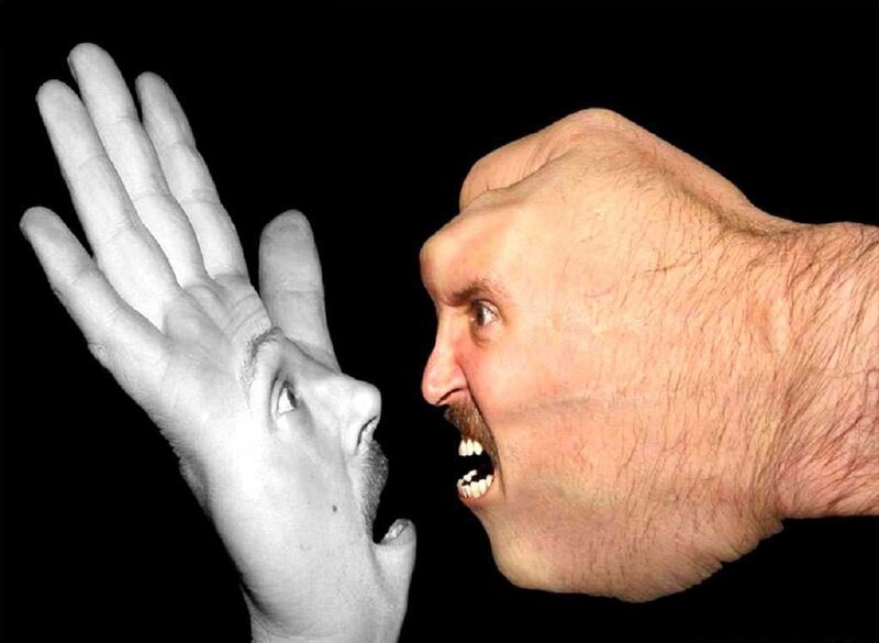 Man's Face on Hand