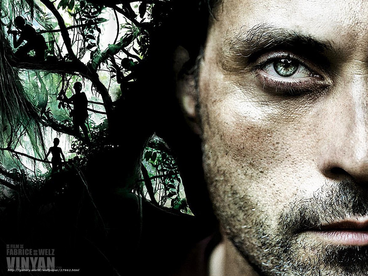 Man's face with jungle scene