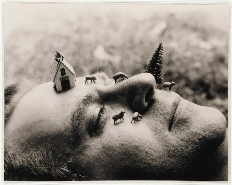 Man's Face with Miniature Figures