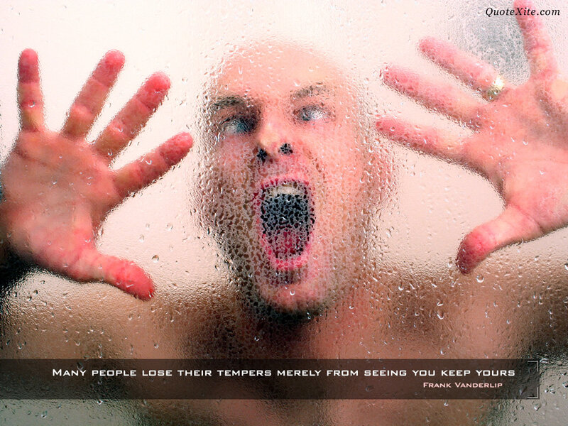 man screaming behind glass