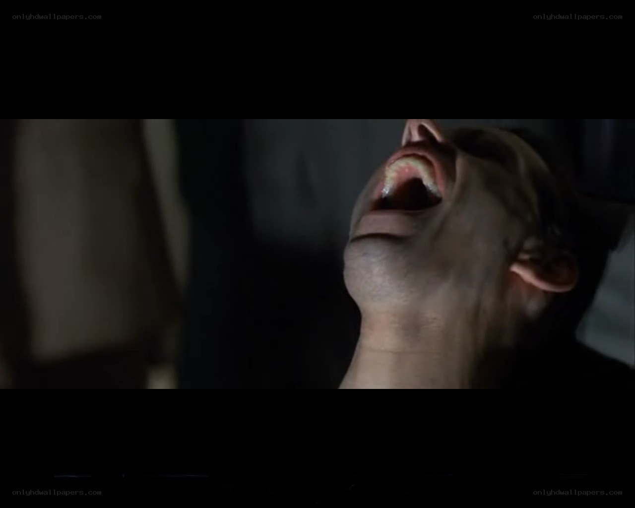 man screaming in pain