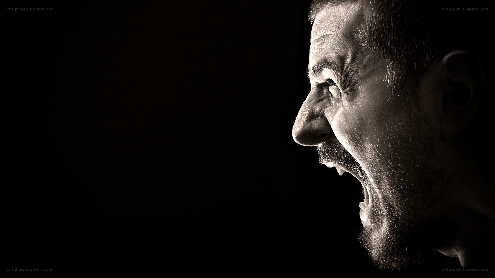 man screaming in profile