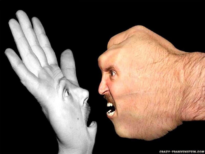 man screaming into hand