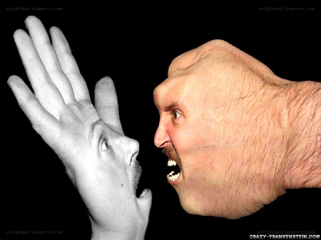 man screaming into hand