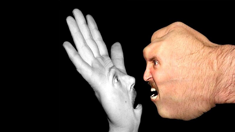 man shouting at hand