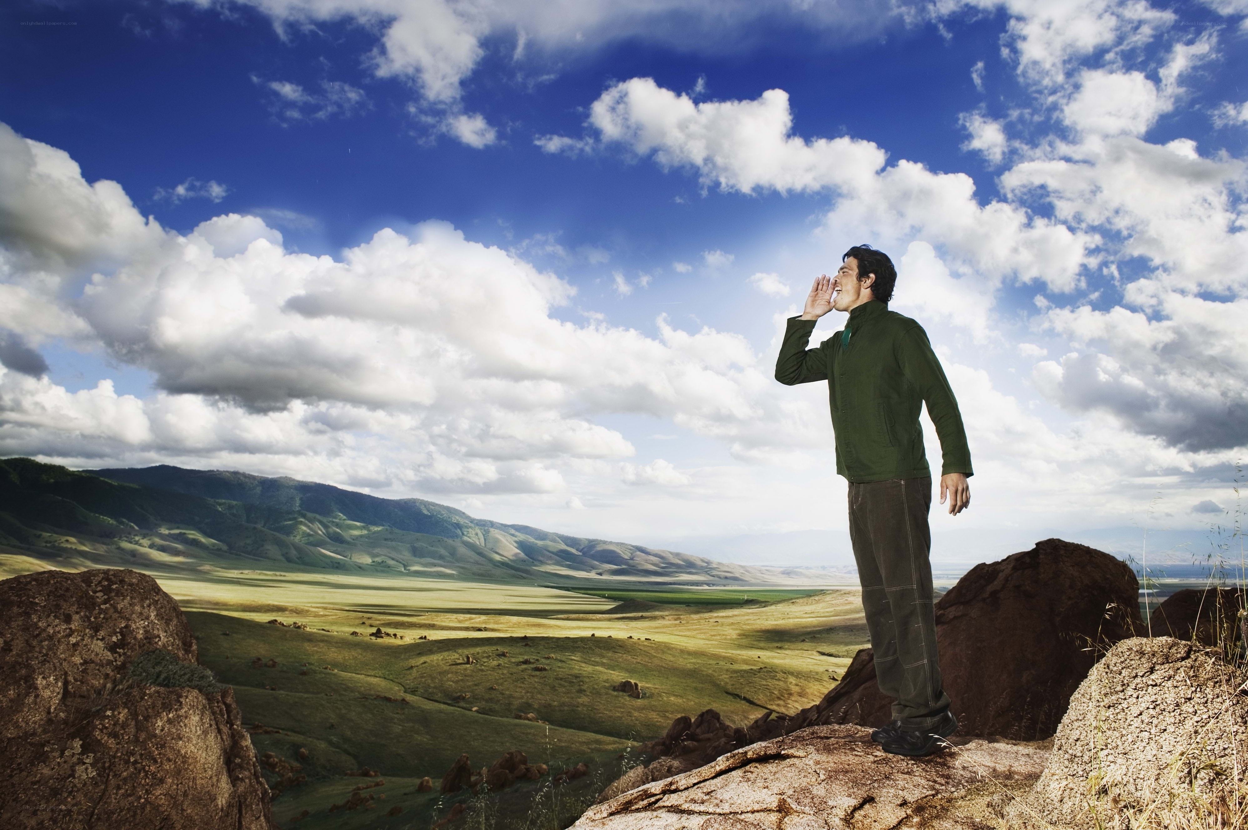Man shouting in a valley