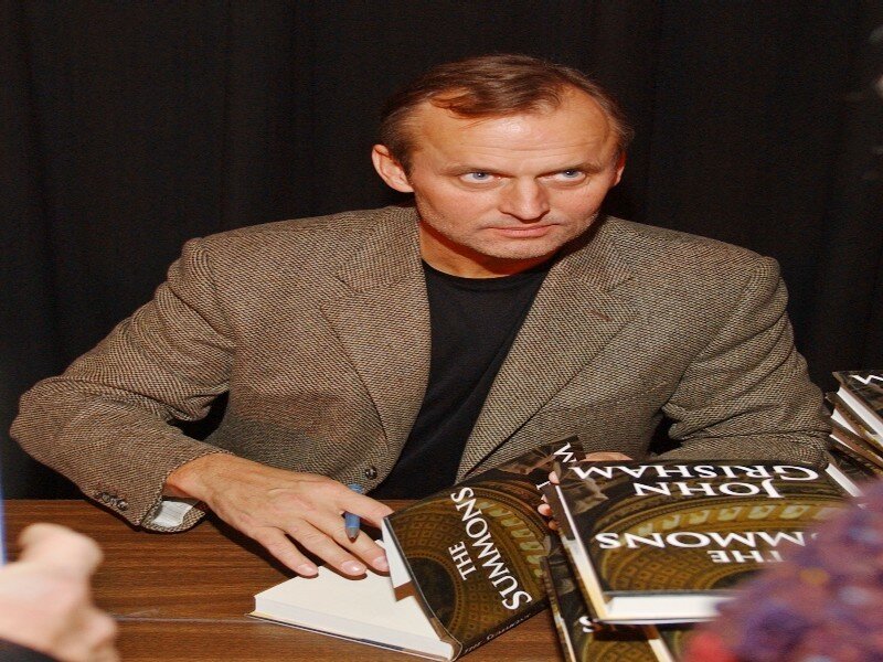 Man Signing Books