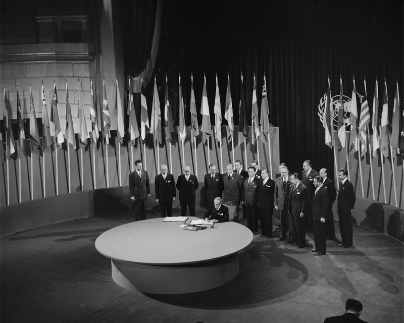 Man Signing Document — Black