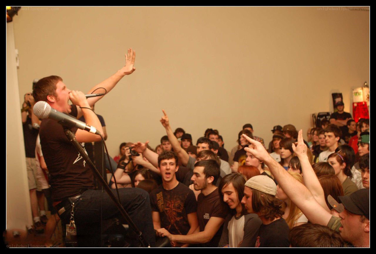 Man singing at a concert
