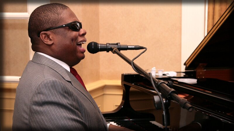 Man Singing at Piano — Gray