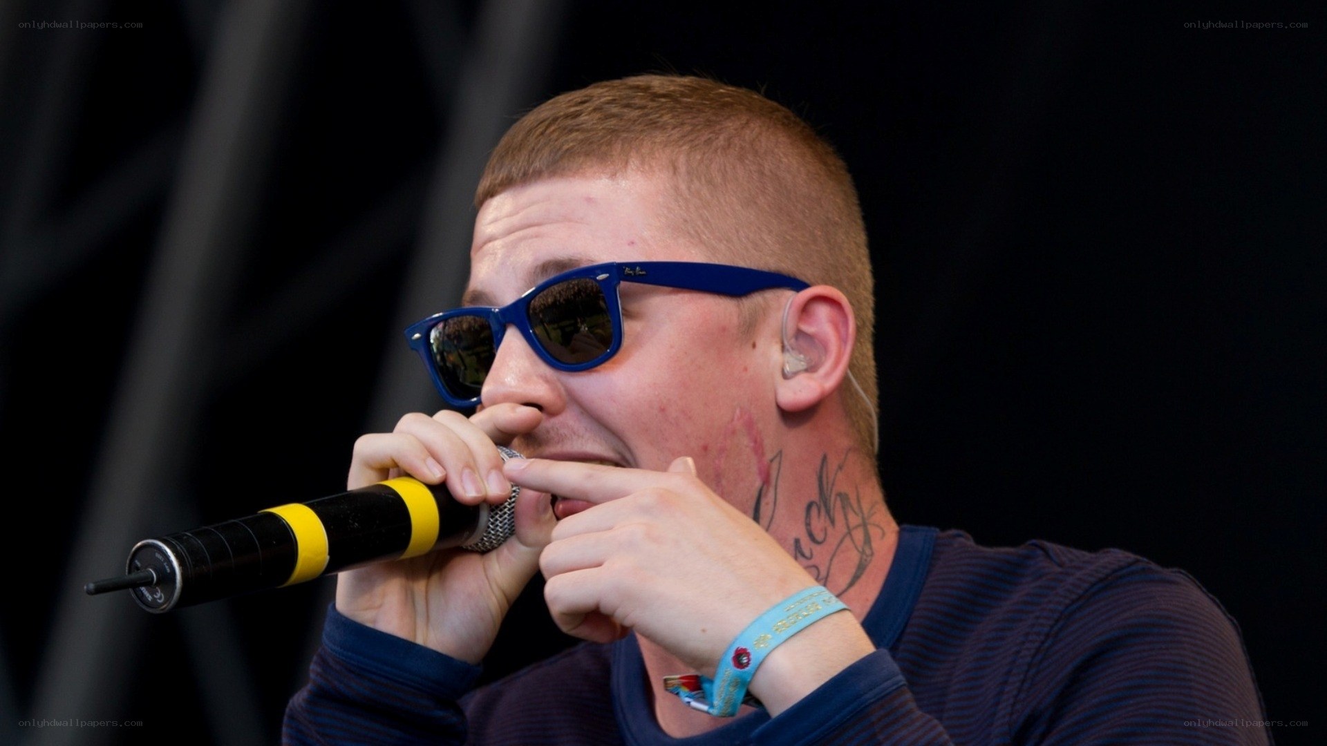 man singing into microphone