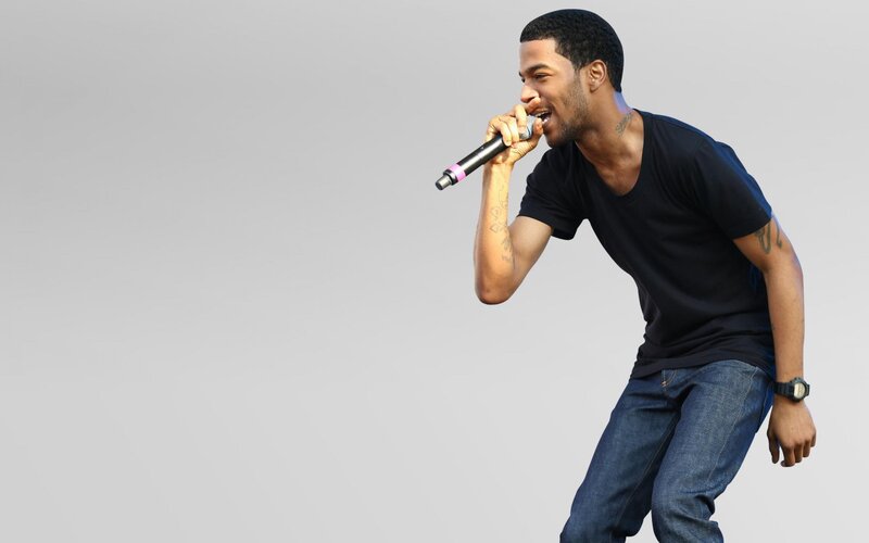 man singing into microphone