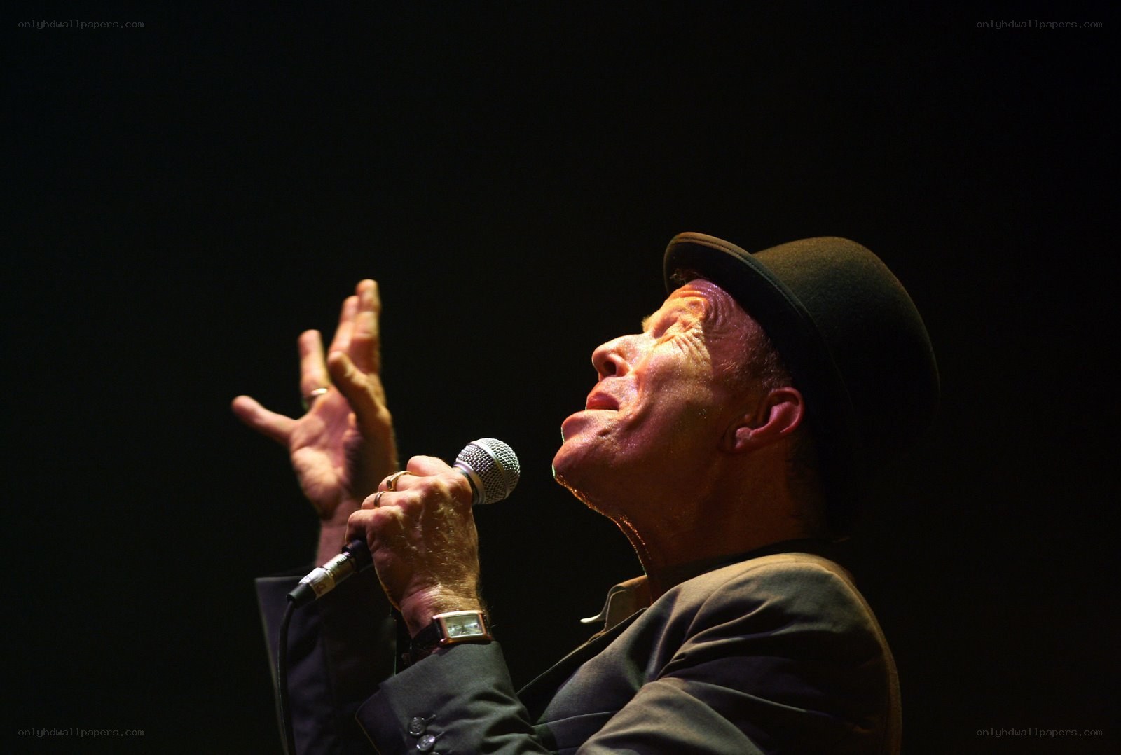Man singing into microphone
