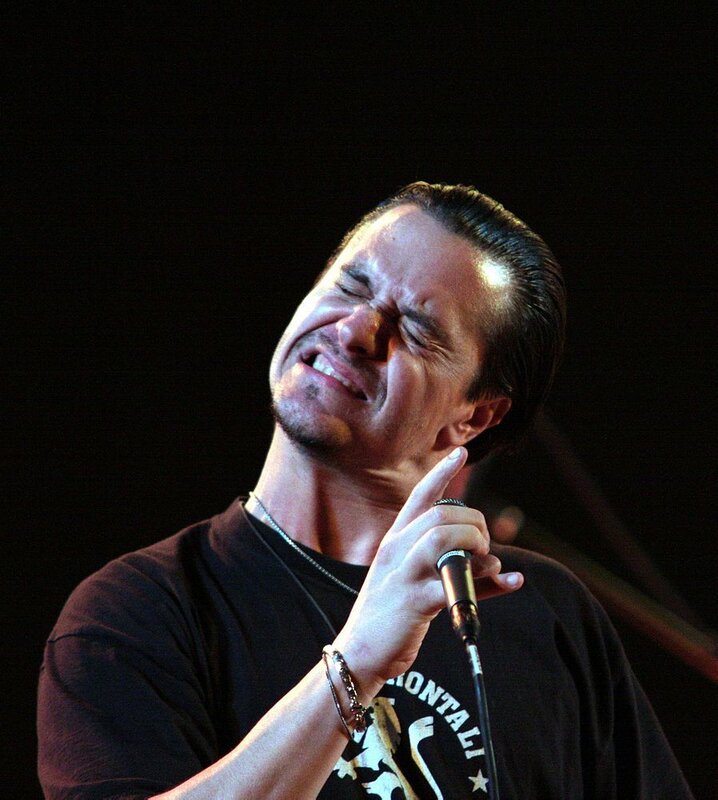Man singing into microphone