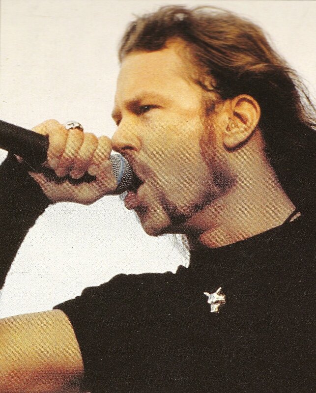 man singing into microphone