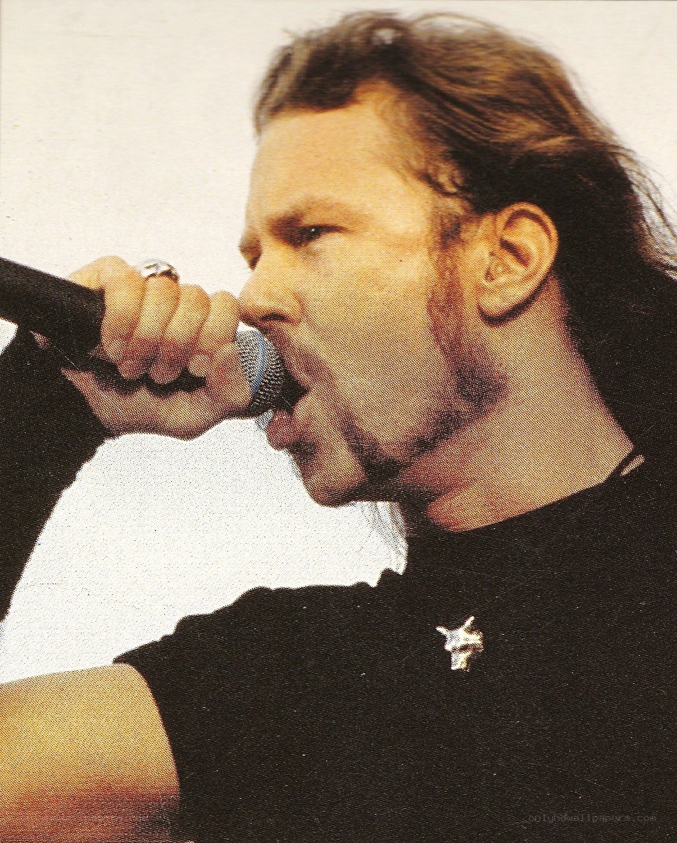 man singing into microphone