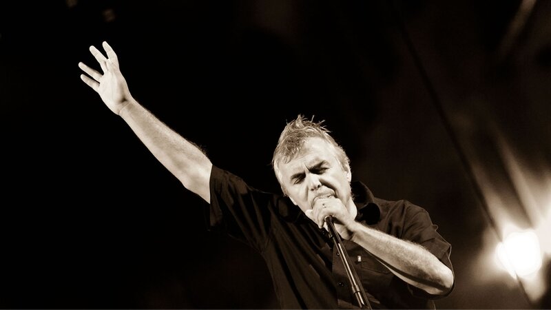 Man Singing into Microphone — Black, Dramatic, Night, Photograph, Hand